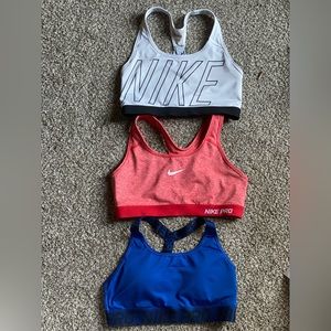 3 medium Nike sports bras